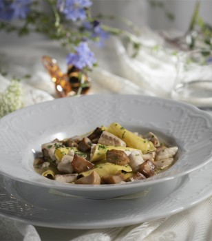 Homemade pasta Pappardelle with white mushrooms and sea bass fillet